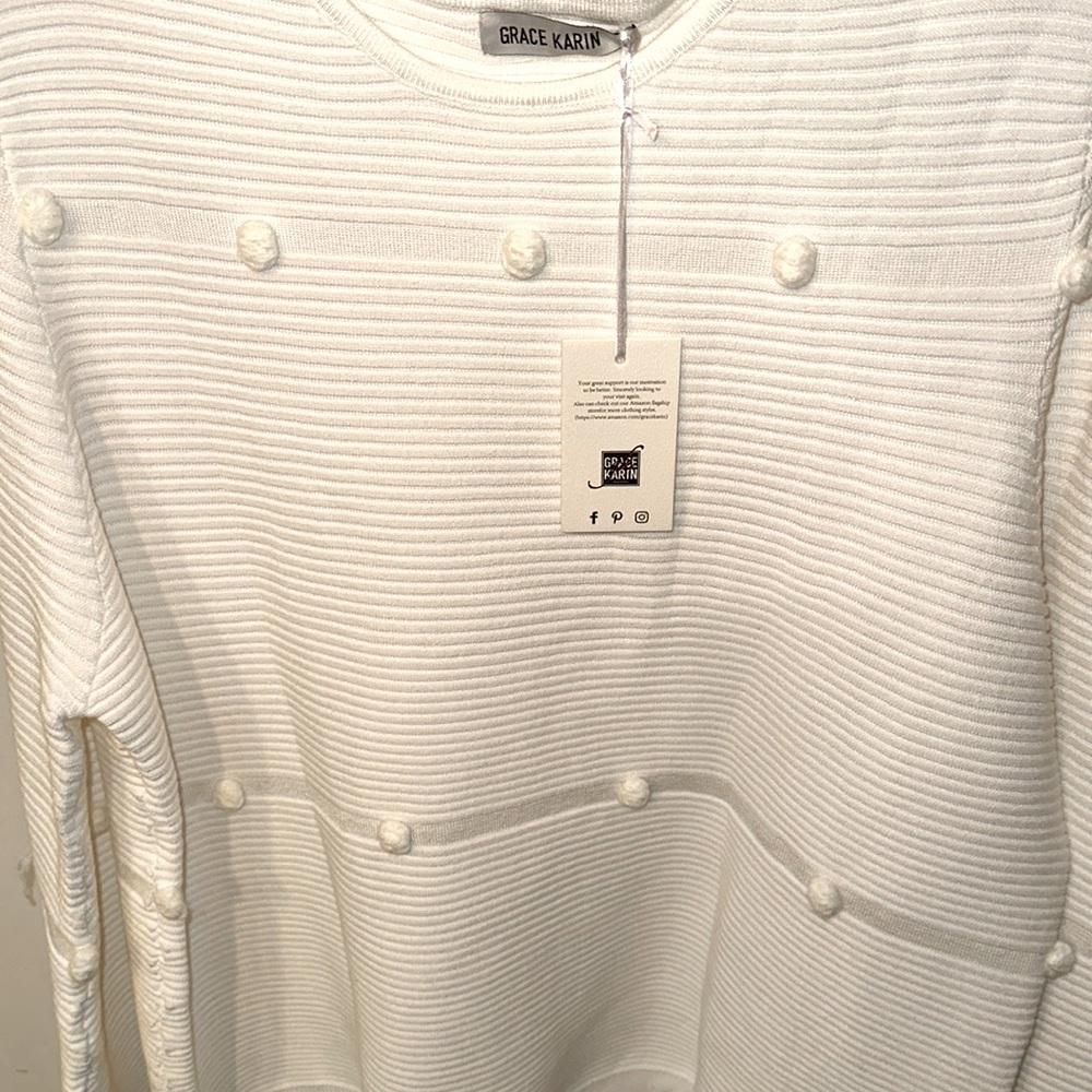 New white sweater, will warm you in cold weather.